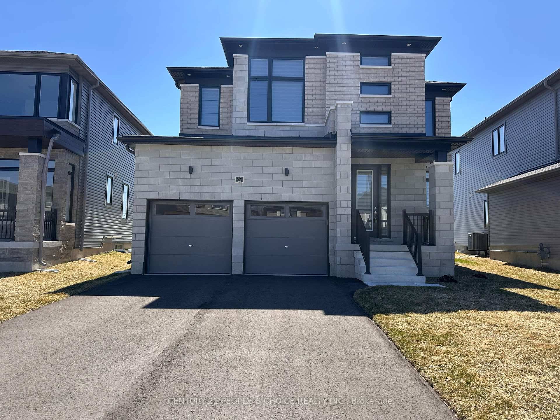 This modern and chic home is nestled within the new development, South Bay at Rivers Edge.