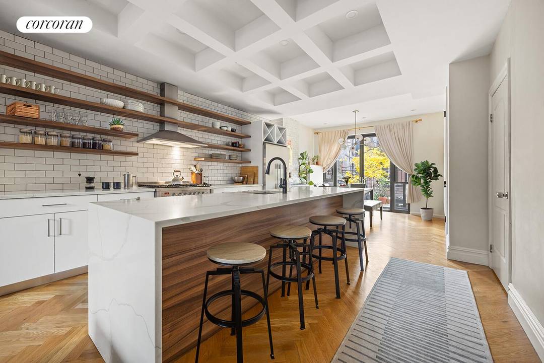 750 Hancock Street is a modern two family brick townhouse set on one of Bedford Stuyvesant's iconic tree lined brownstone blocks.