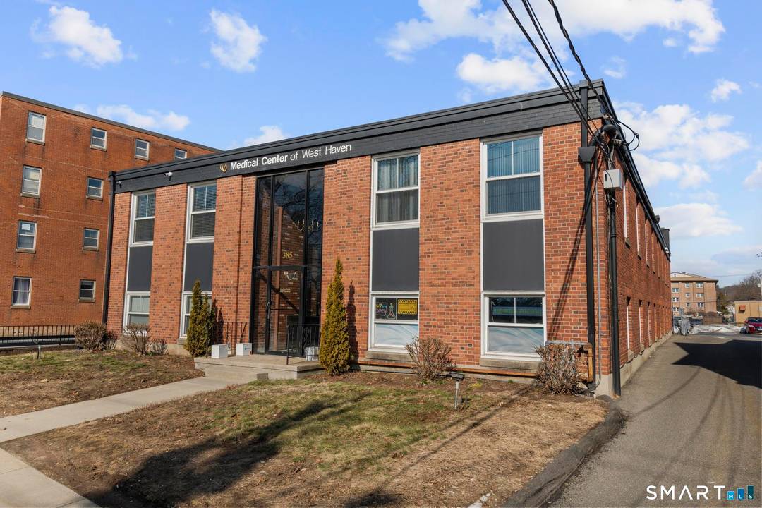 10, 272 SF two story brick medical professional office building located in the Central Business District of West Haven directly across from the historic West Haven Green.