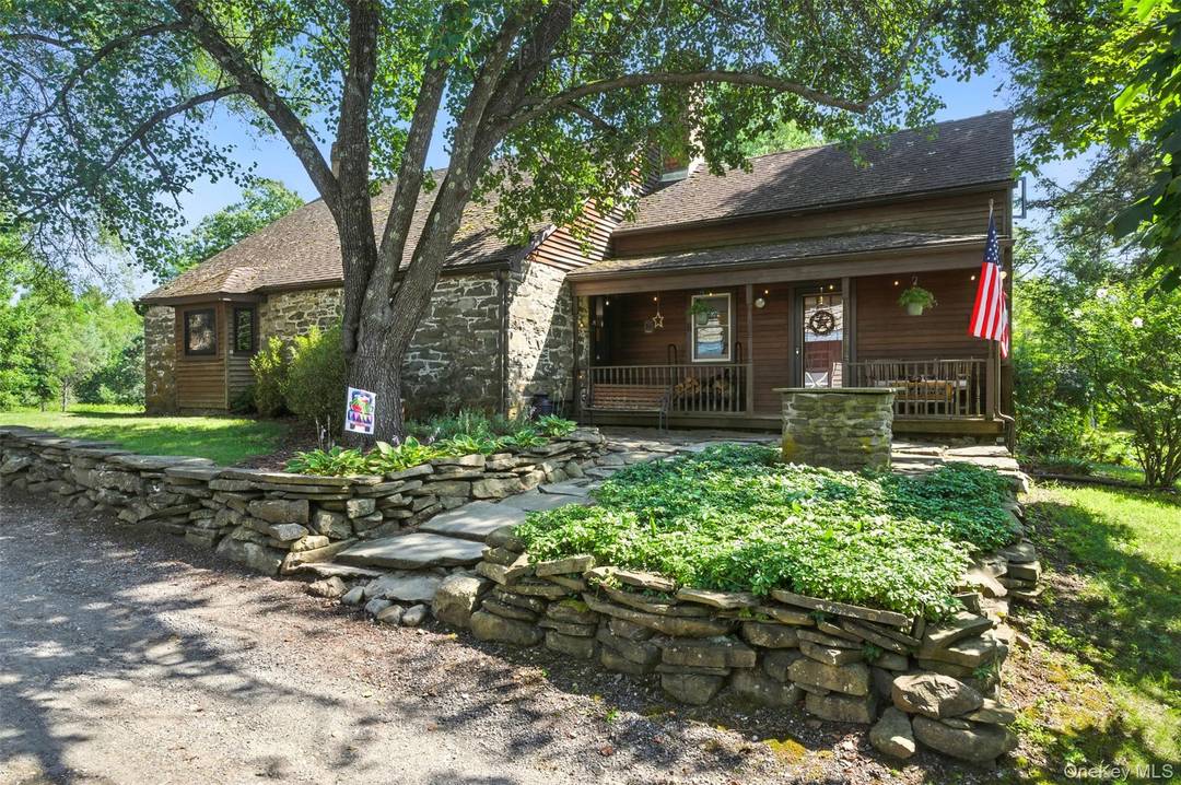 Own a Timeless Piece of Historic New Paltz with this exquisitely restored 1797 stone amp ; cedar farmhouse nestled on 7.