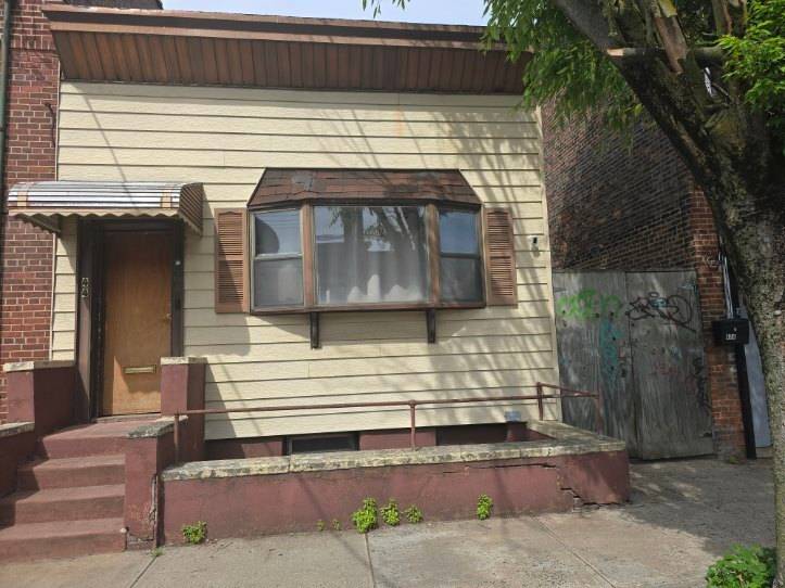 20x40 wood frame one family house on a 25x100 lot on an eclectic street in Red Hook, Brooklyn.