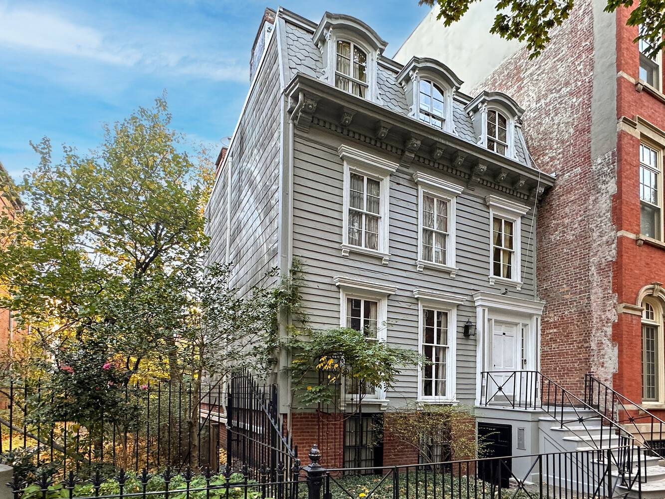 69 Orange has been meticulously preserved by the current owners and contains all original features, such as handrails, woodworking, hardware, molding, and historical milk paint.