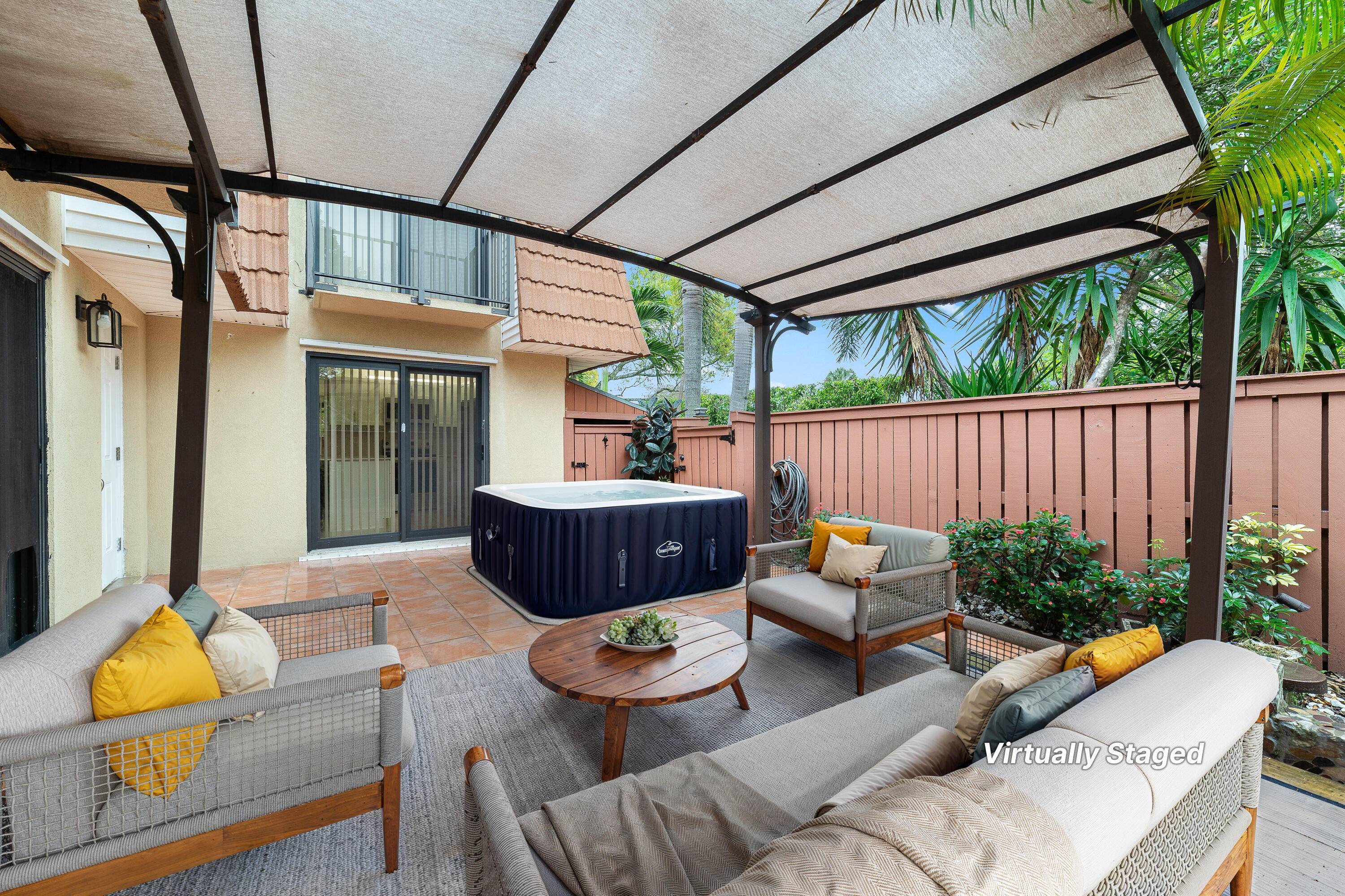 This meticulously cared for townhouse features a brand new kitchen with quartz countertops and sleek wood cabinets offering a modern and clean style.