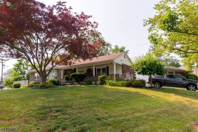 This beautiful Ranch Style property, features a big living room, dining room, 3 bedrooms, 2 full bath, Kitchen with island.