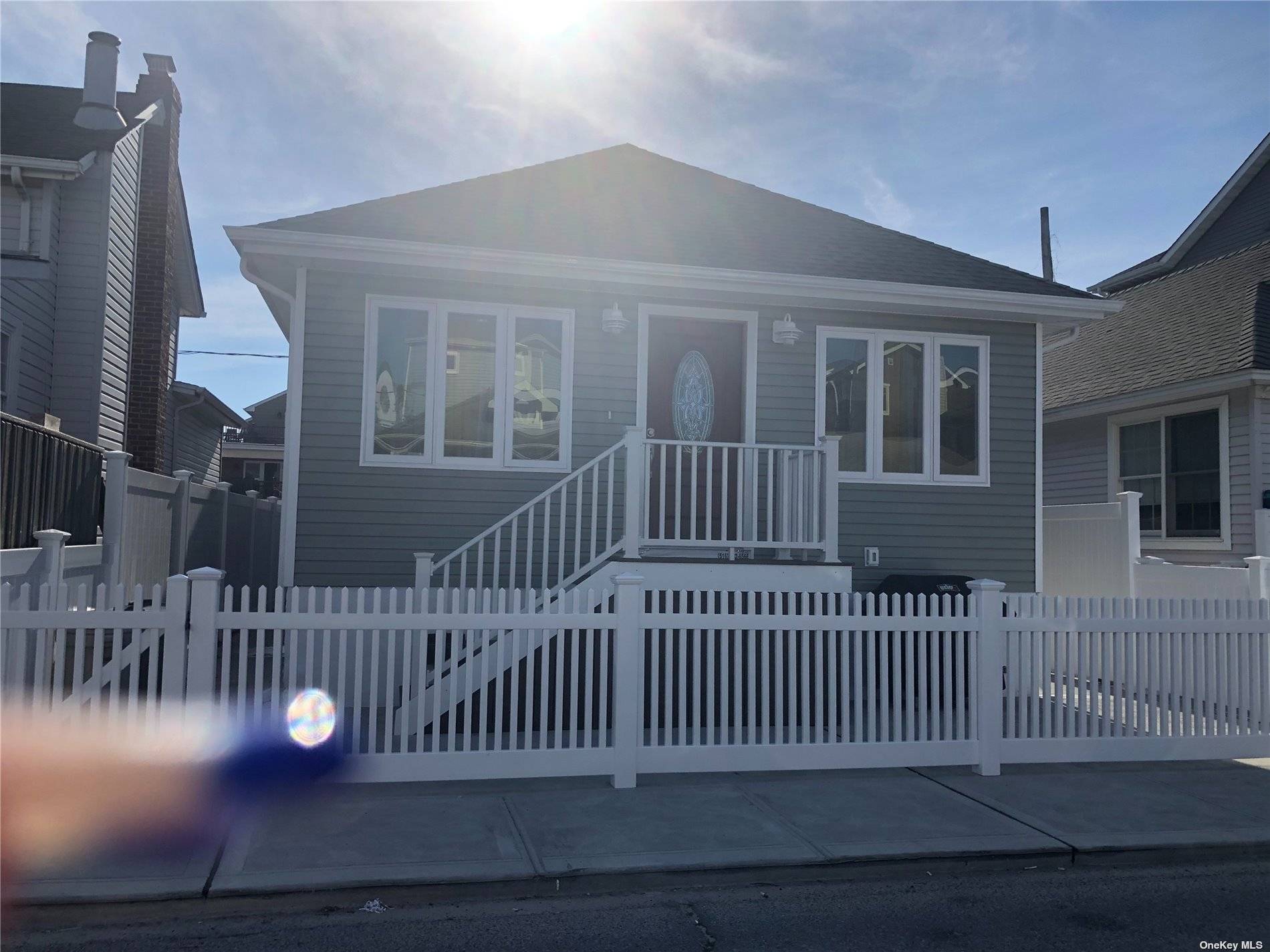 Stunning completely remodeled from top bottom 2 bedroom 1bath Beach House with open floor plan, hardwood floors, high ceilings new kit with stainless steel appliances new bathroom ductless ac units ...