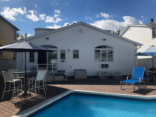 This classic Cape Cod style home has been thoughtfully expanded with extensions to the basement, first floor, and a full back dormer on the top floor, creating a truly custom ...