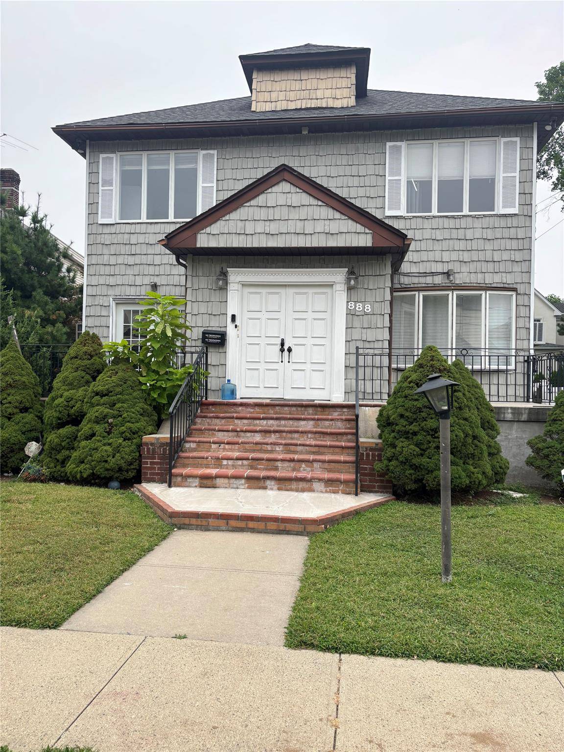 A center hall Woodmere Colonial in Woodmere.