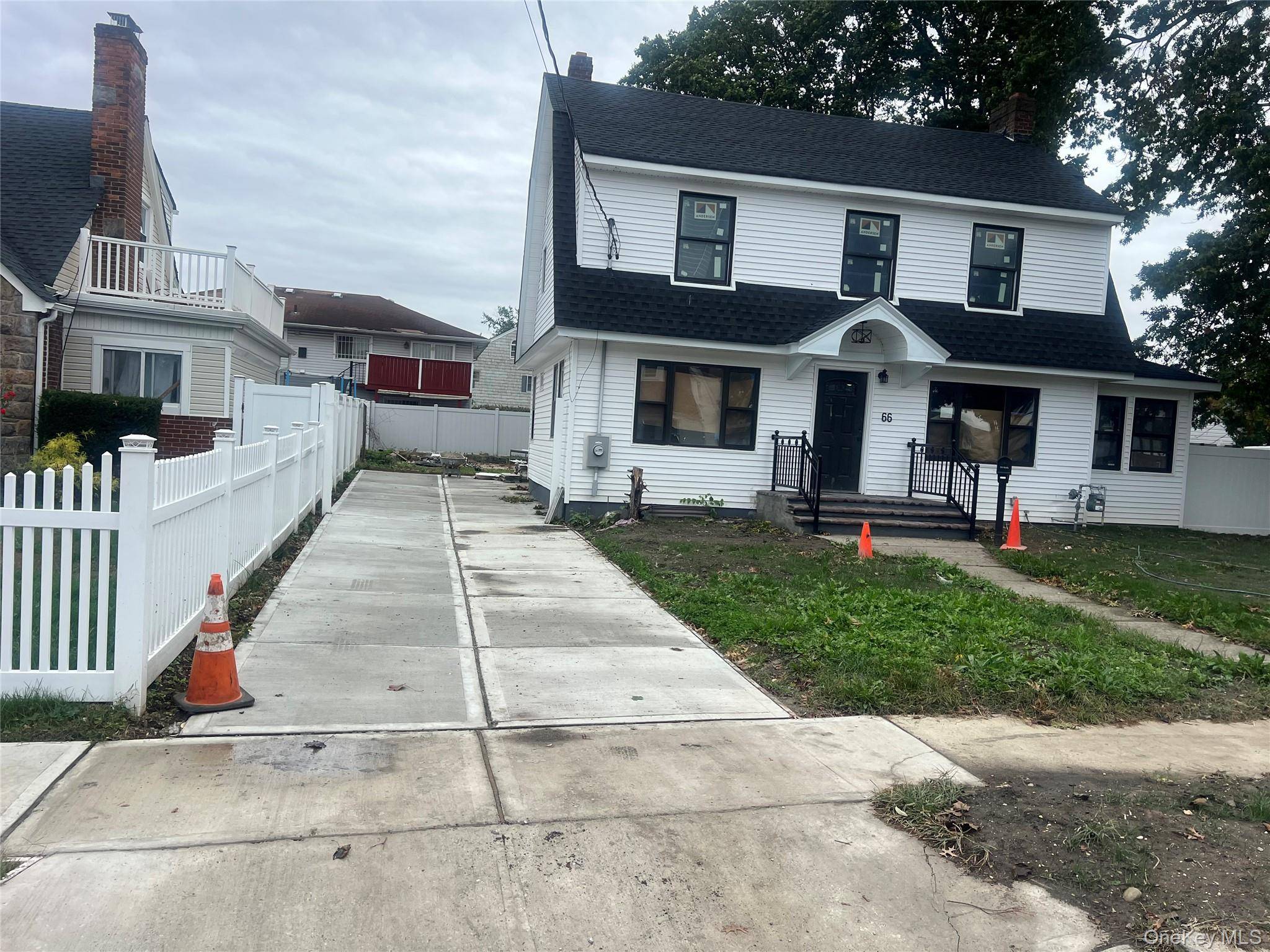 completely renovated with hardwood floor new kitchen and tile floor.