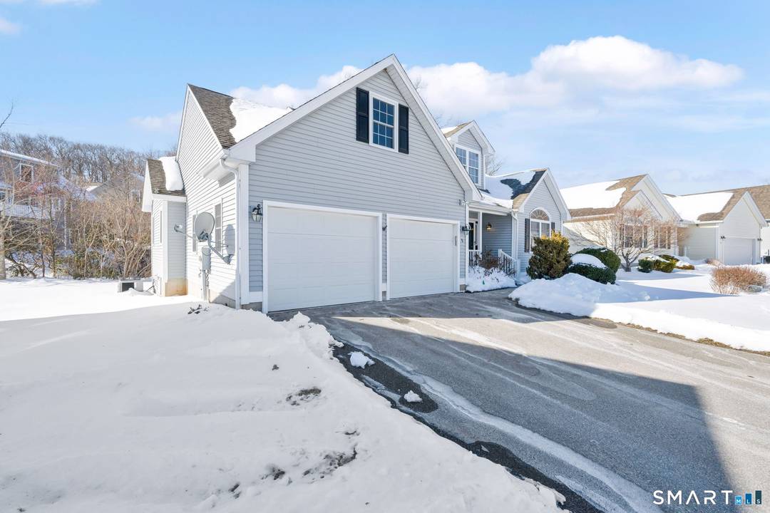 Welcome to this immaculate home in one of East Hampton's most desirable 55 communities.