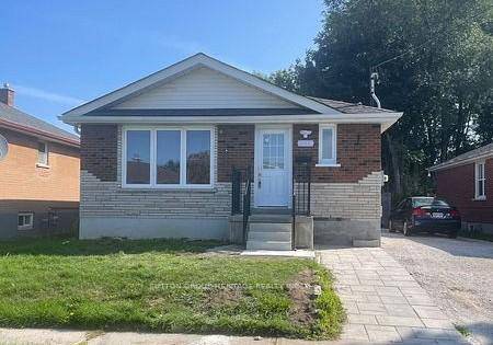 Bright amp ; Welcoming 3 2 Bedroom, Brick Bungalow on Quiet Side Street, Perfect for First Time Buyer or Investor.