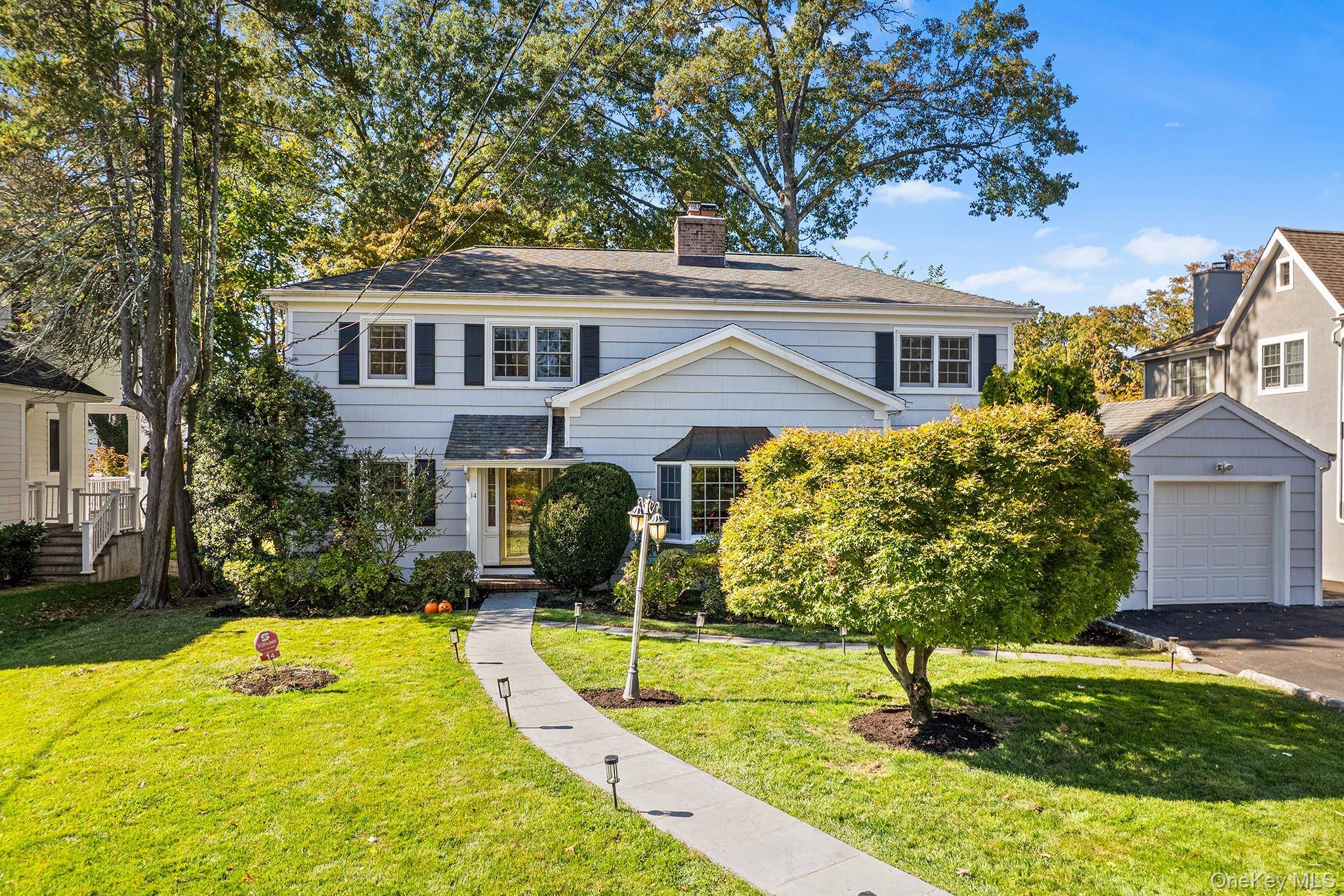 Terrific Heathcote Colonial offering an open floor plan, great flow, and spacious rooms throughout.