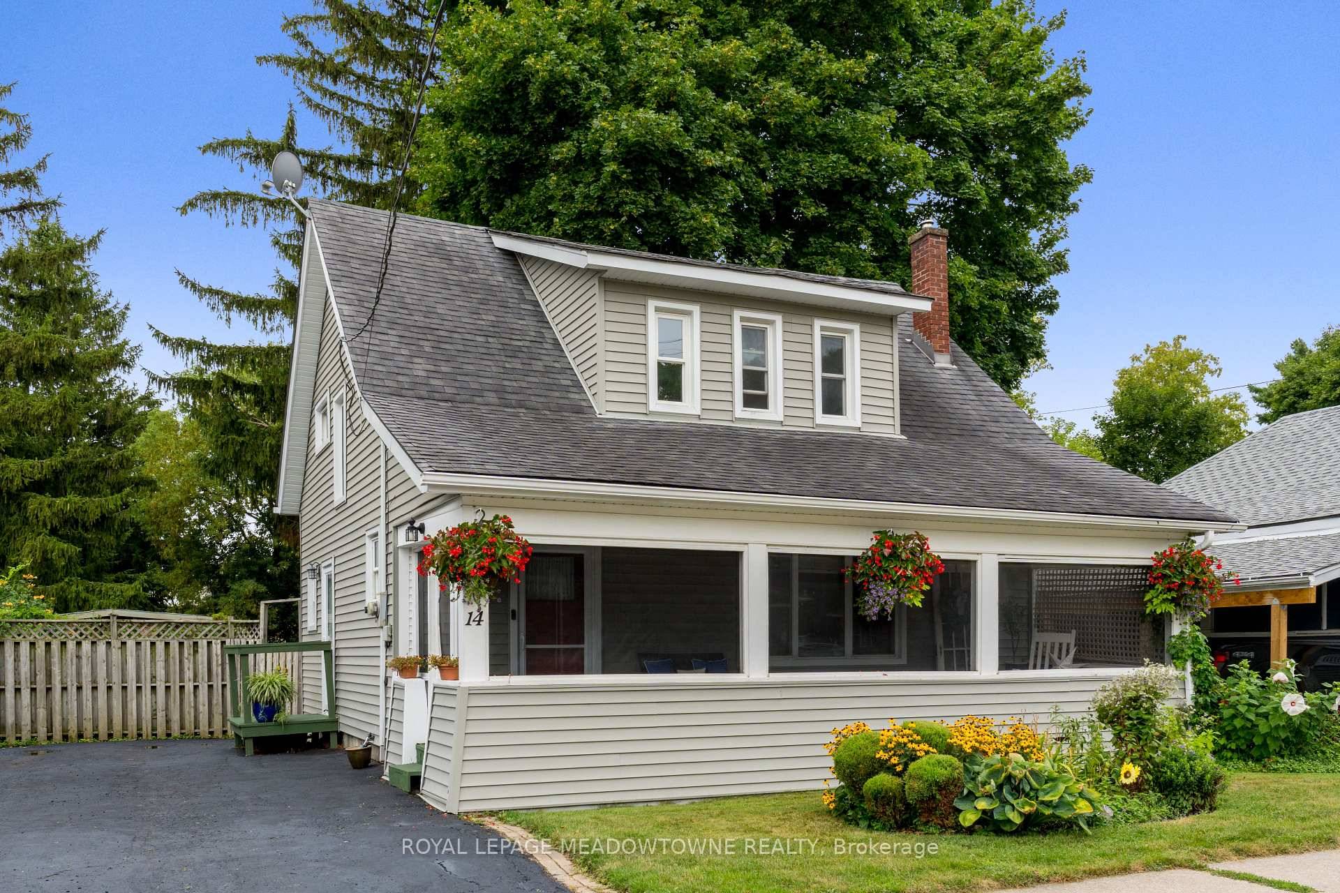 Set on a 50 x 132 ft lot with mature trees and privacy, this one and a half storey home is located on a quiet street in central Georgetown.