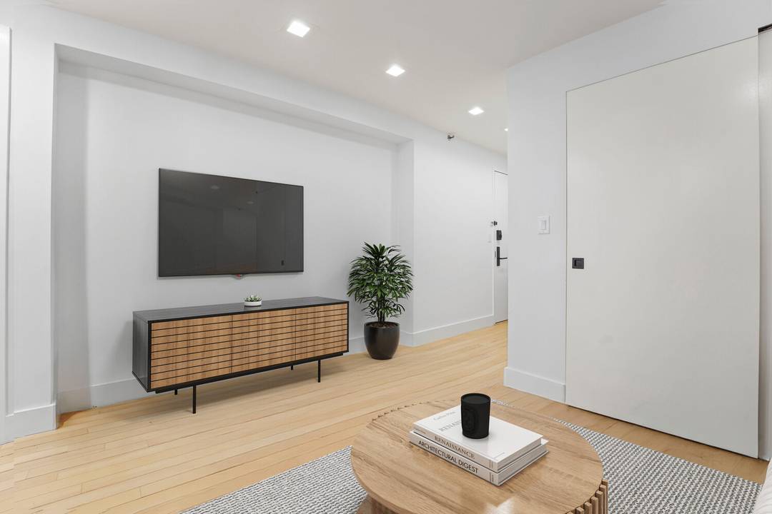 This sun filled, fully renovated two bedroom or 1 bedroom home office, two full bathroom condo is ideally situated in the heart of the East Village with views of Tompkins ...