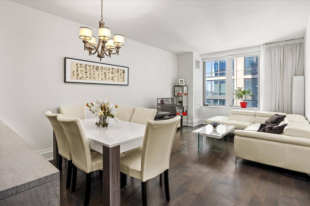 This gracious 1, 302 SF two bedroom, 2.