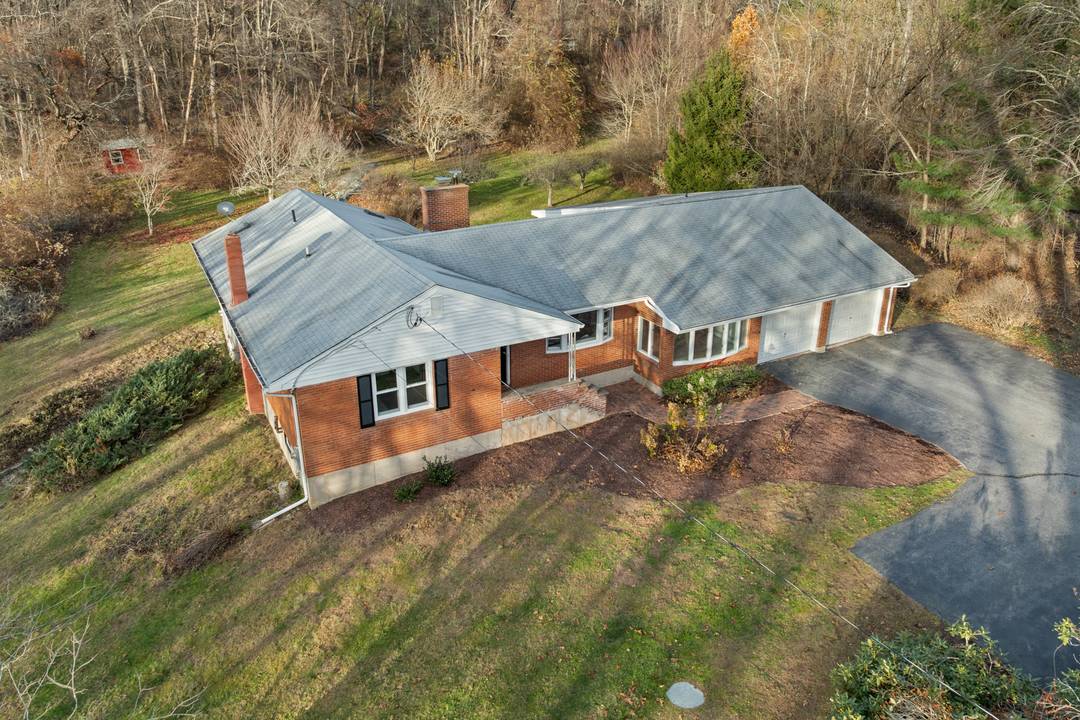 Newly Reduced ! A stunning, move in ready ranch style home on 1.