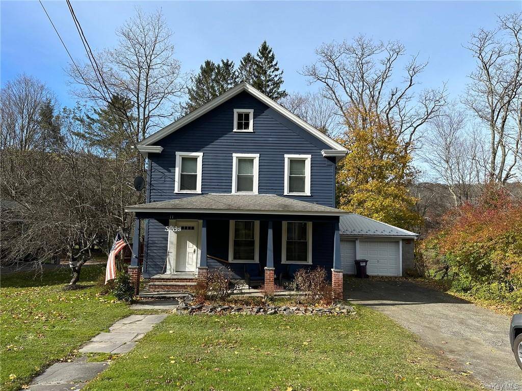 1900s two story house close to town in Trout Town USA.