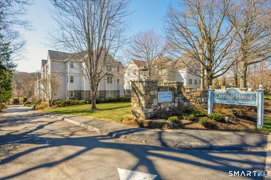 Top level unit in an elevator building with secured lobby and parking.