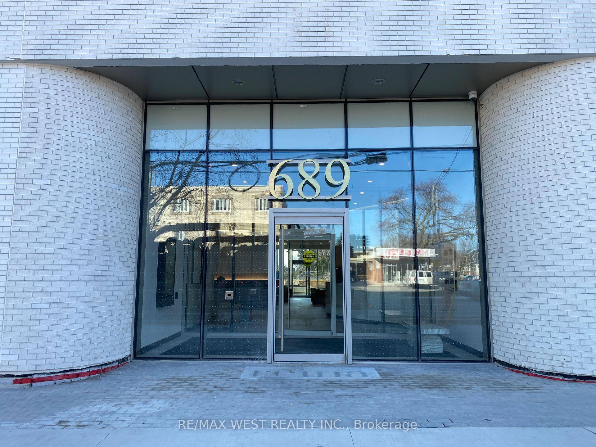 Reina is an elegant 9 story white brick condominium crafted by Urban Capital amp ; spotlight Development.