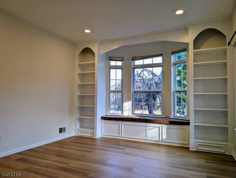 This fully renovated, north facing home in the Woodsedge community features wood flooring throughout, a brand new kitchen with quartz counters and stainless appliances, updated bathrooms, fresh paint, and bright, ...