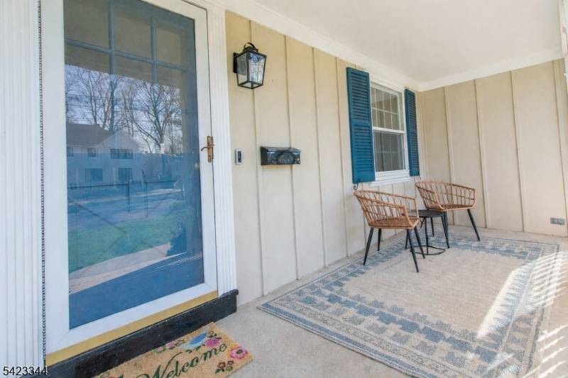 CHARMING BRIGHT COLONIAL with pleasant curb appeal Covered Lemonade Porch is set on a QUIET neighborhood street on a DEEP LEVEL.