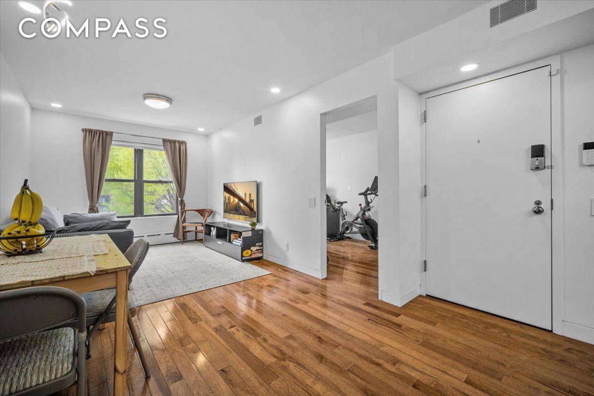 Welcome to 1477 Prospect Avenue, Unit 2 a fully renovated, 931 sq ft smart home designed for modern luxury living.