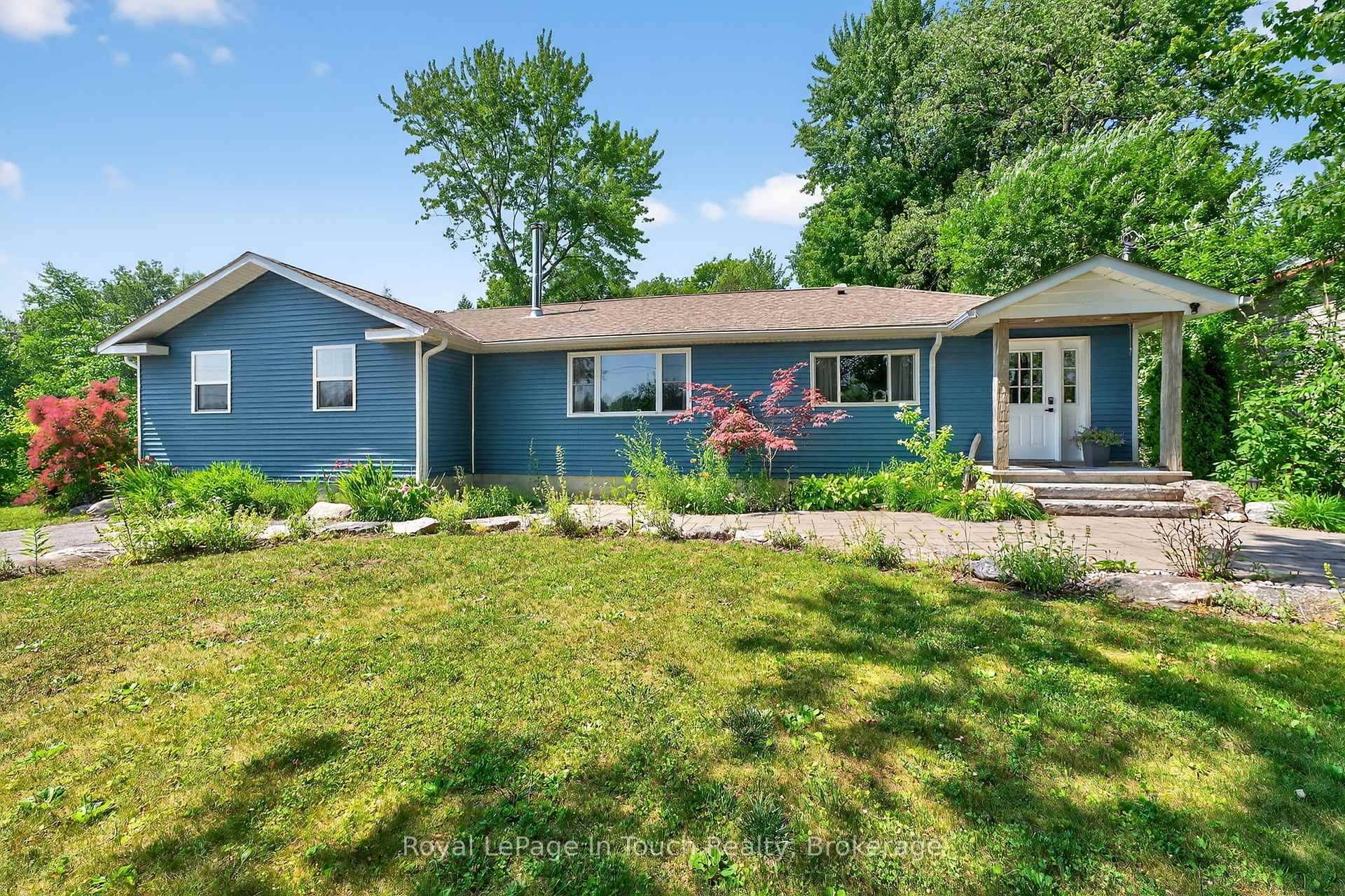 Steps From Georgian Bay, This Charming And Tastefully Updated Bungalow Is Nestled On A Spacious And Private Lot.