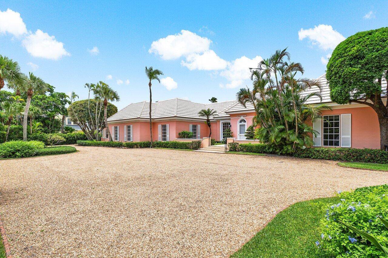 This never before offered property is one of the few homes sitting directly on Fairway 5 of the renowned Jupiter Island Club.