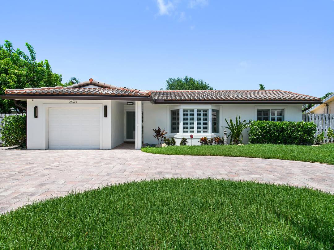 Beautifully renovated 4 bedroom 3 bathroom split floor plan residence nestled in the charming town of Lighthouse Point.