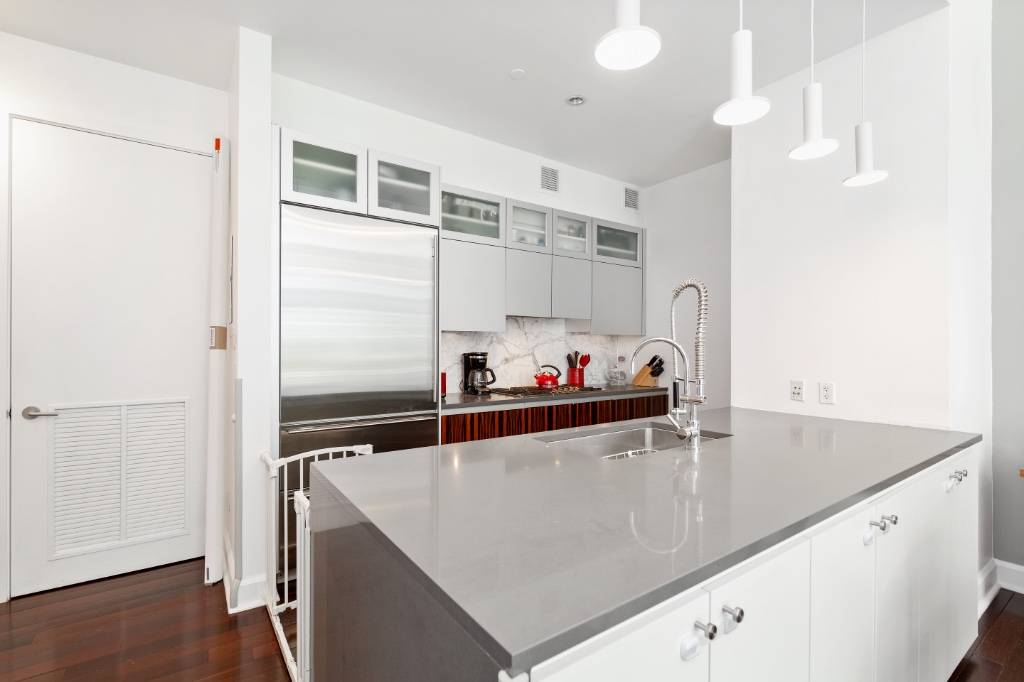 Welcome home to this fantastic high end loft 2 bedroom, 2 bath residence located in the heart of Manhattan.