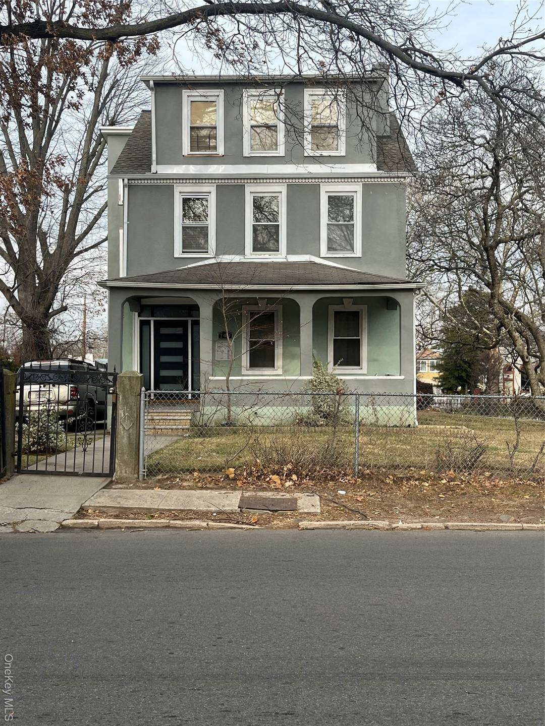 Don t miss this rare opportunity to own a detached three family property set on an oversized double lot in Mount Vernon.