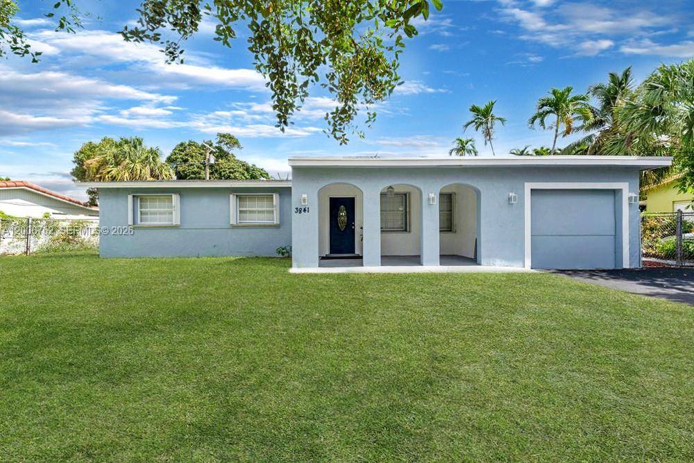 Elegant 4 bedroom, 2 bathroom pool residence in the heart of Lauderhill, thoughtfully designed for both refined living and effortless entertaining.