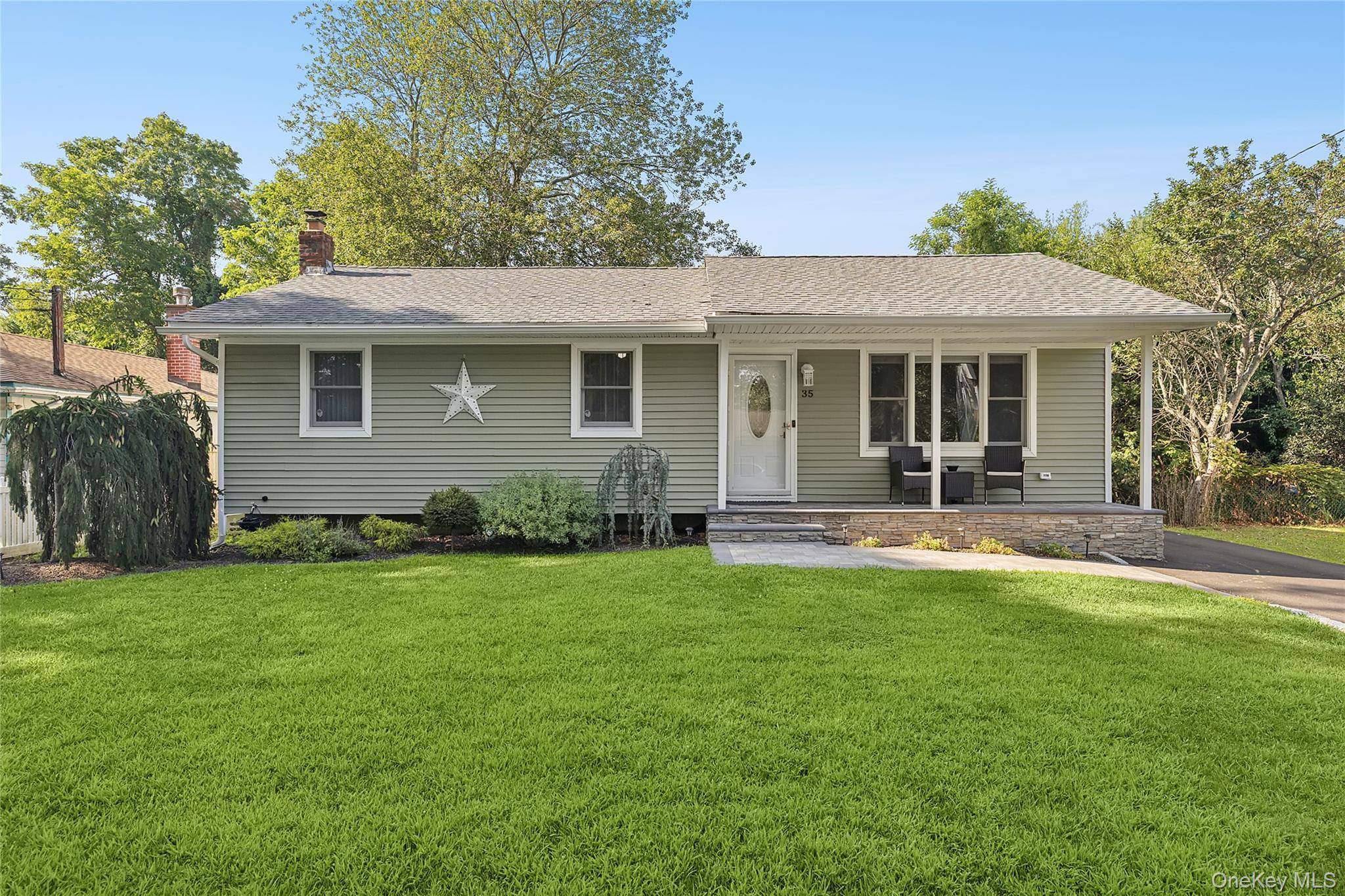 Don't miss this ultra mint ranch with three main floor bedrooms, and full bath updated EIK with chrome appliances and lower level with extra bedroom, full bath, and den !