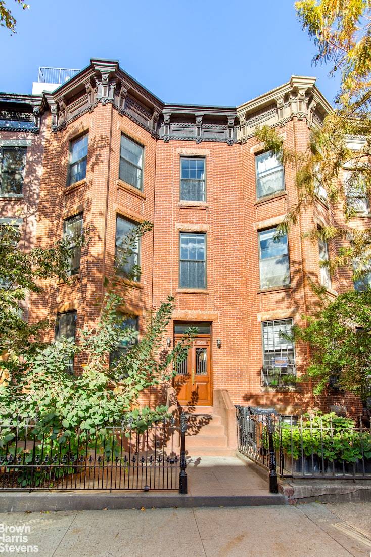 Spread out in this lovely two bedroom, two bath condo off 5th Avenue in prime Park Slope with prewar details and craftsman finishes.