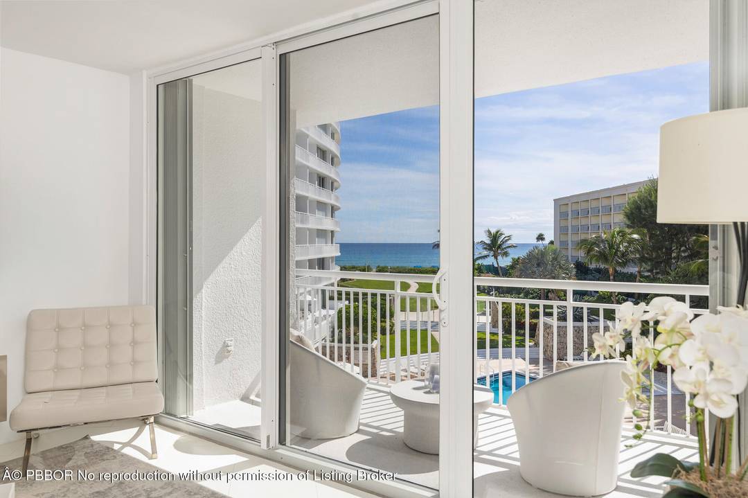 Experience effortless oceanfront living in this fully renovated two bedroom, two bath residence with sweeping Atlantic views from every room.
