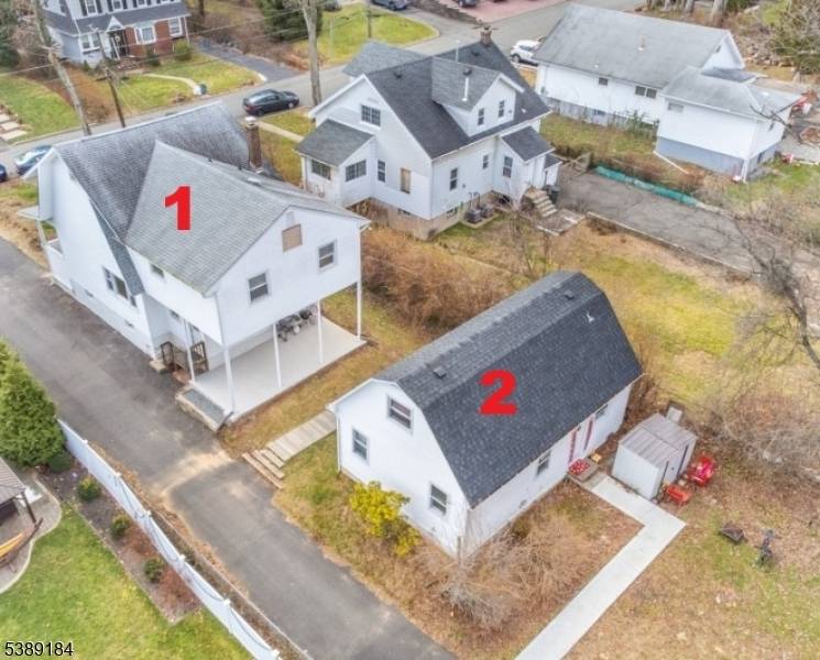 Don't miss out on this unique legal 2 family front and back property, situated on a spacious 60 x 205 foot lot.