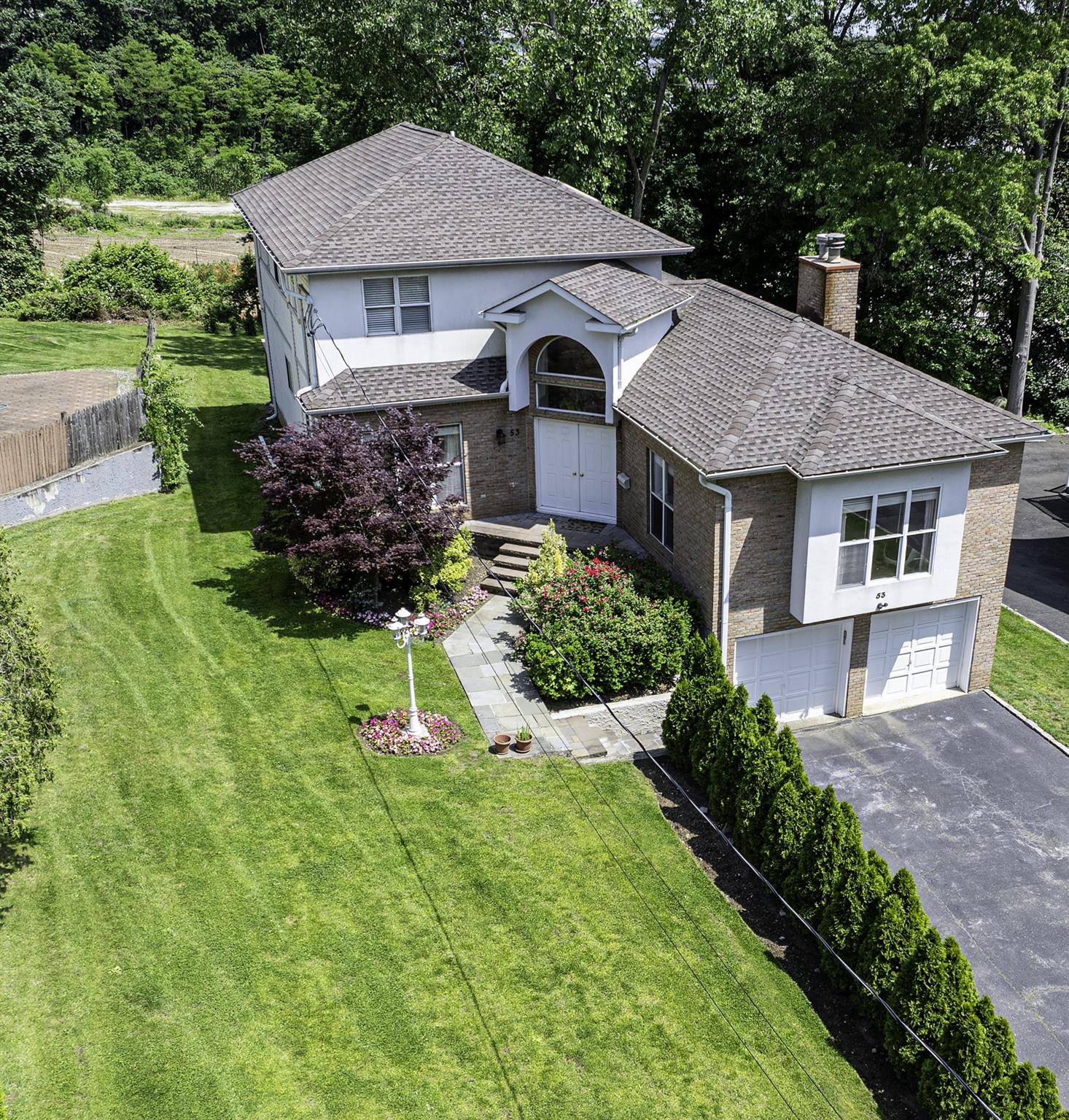 Welcome to this beautifully maintained Colonial style home offering over 4, 000 square feet of comfortable living space.