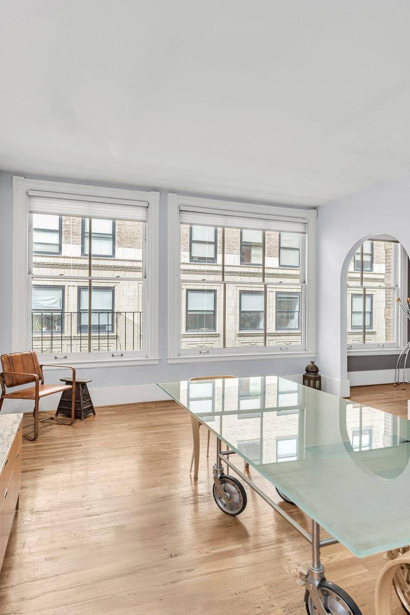 This sun drenched full floor loft captures the essence of authentic Tribeca living.
