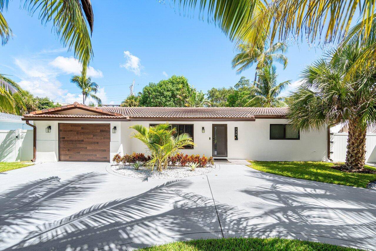 Welcome to 739 NW 7th St, a completely renovated modern and furnished home with no expense spared !