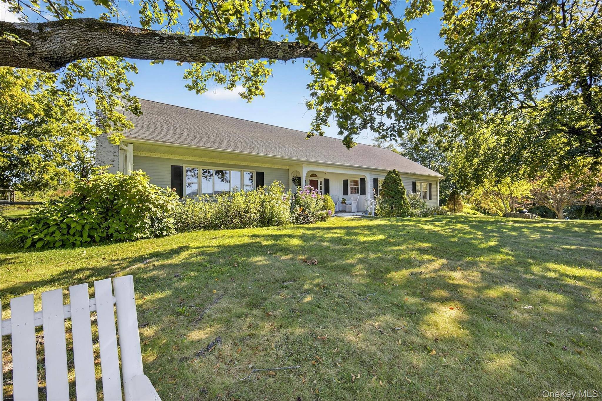 Offered for the very first time, this lovingly built and maintained 1950s ranch with full walk up attic, sits on 2.