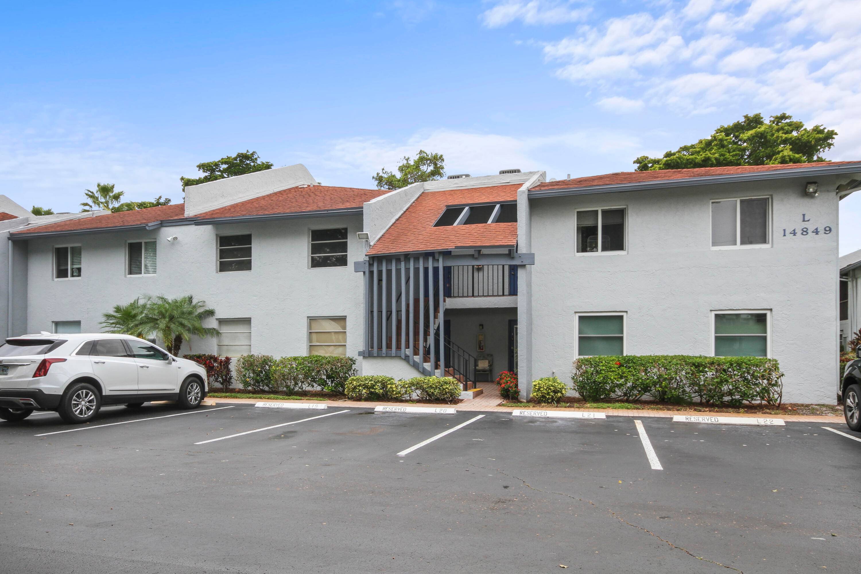 Nestled in the highly desireable, gated community off Atlantic Ave, this second floor unit is professionally updated with breathtaking views of the clubhouse and pool.