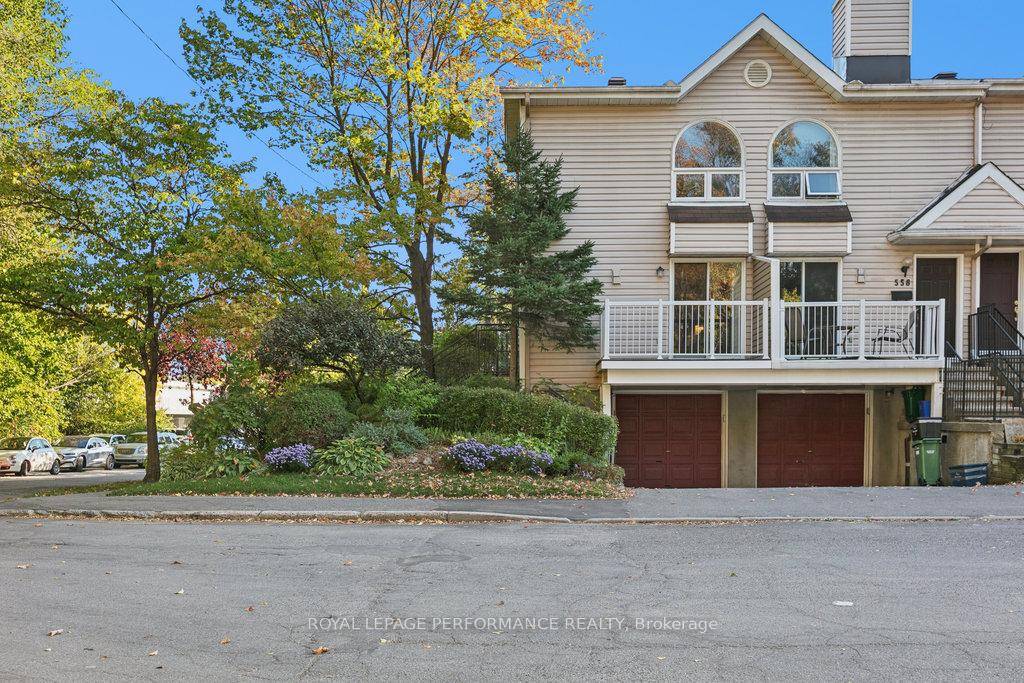 Rare Find End Unit Freehold Townhome Fronting on NCC Land !