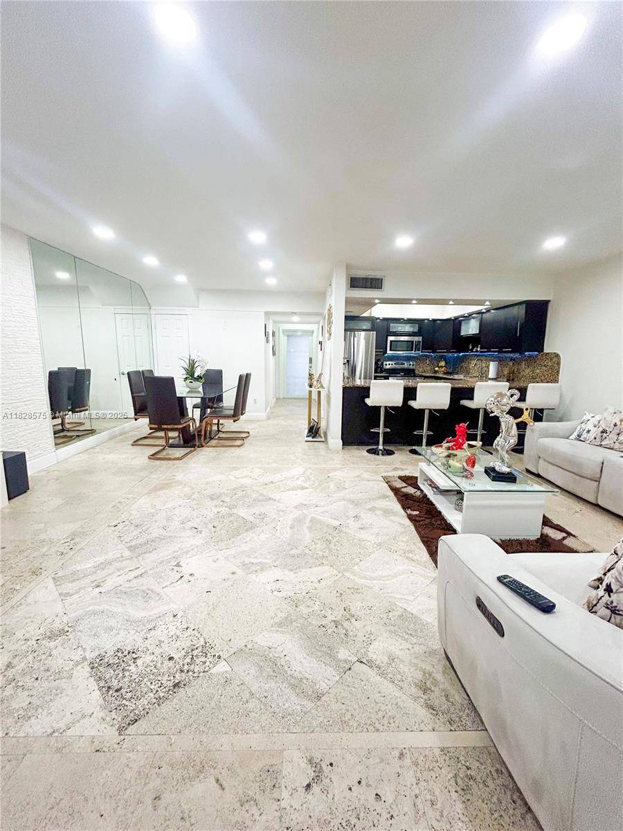 1, 716 sq ft Updated Townhouse Minutes from Miami Lakes Originally 3 beds, now 2 oversized master suites each w private bath readily convertible back to 3 beds.