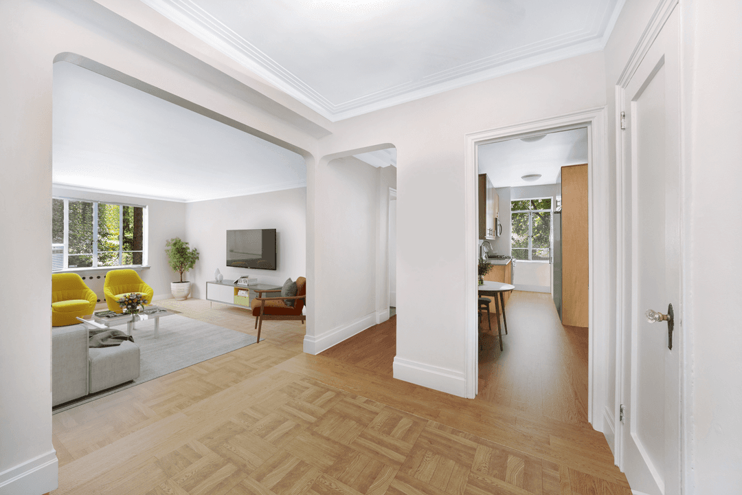 Unit 1CW at Chelsea Gardens is a pre war one bedroom apartment, elevated above the garden, that feels like it's on the second floor.