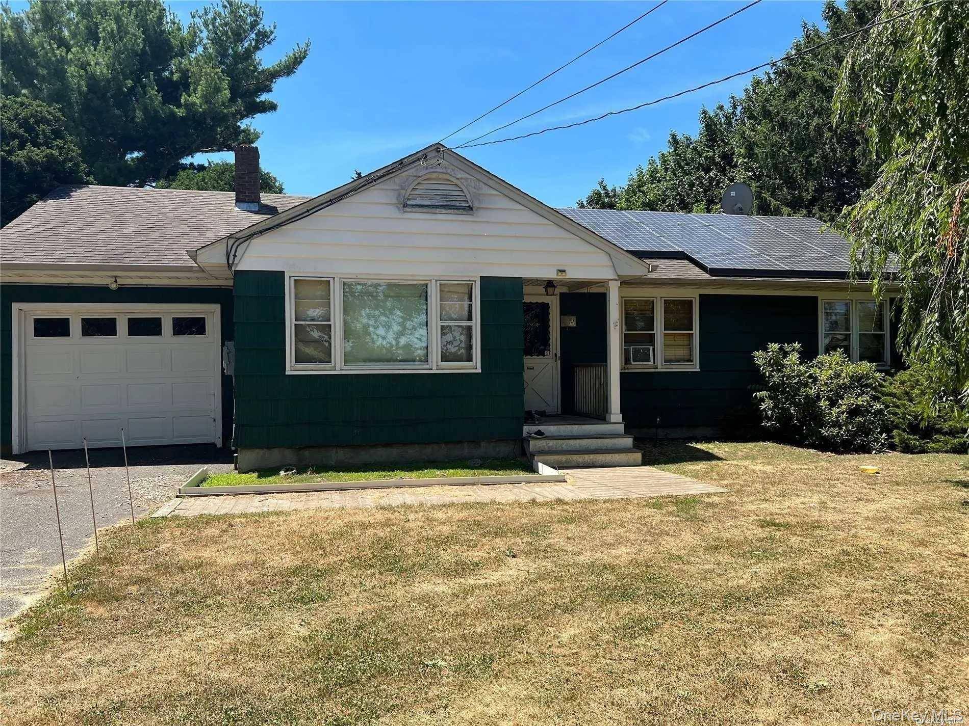 Charming North Fork Fixer Upper with Endless Potential !