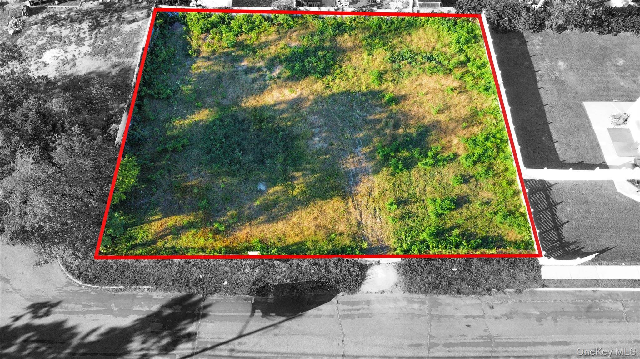 Land nestled on a spacious 125 x 100 lot in a quiet Lindenhurst cul de sac, this property offers a prime development opportunity with subdivision potential.