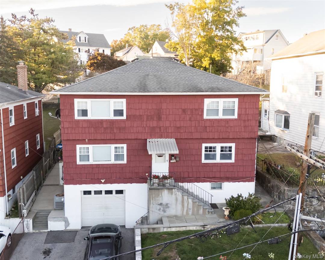 Beautiful Two Family Home with Spacious Layout and Endless Possibilities Welcome to this fabulous two family home offering comfort, convenience, and charm.