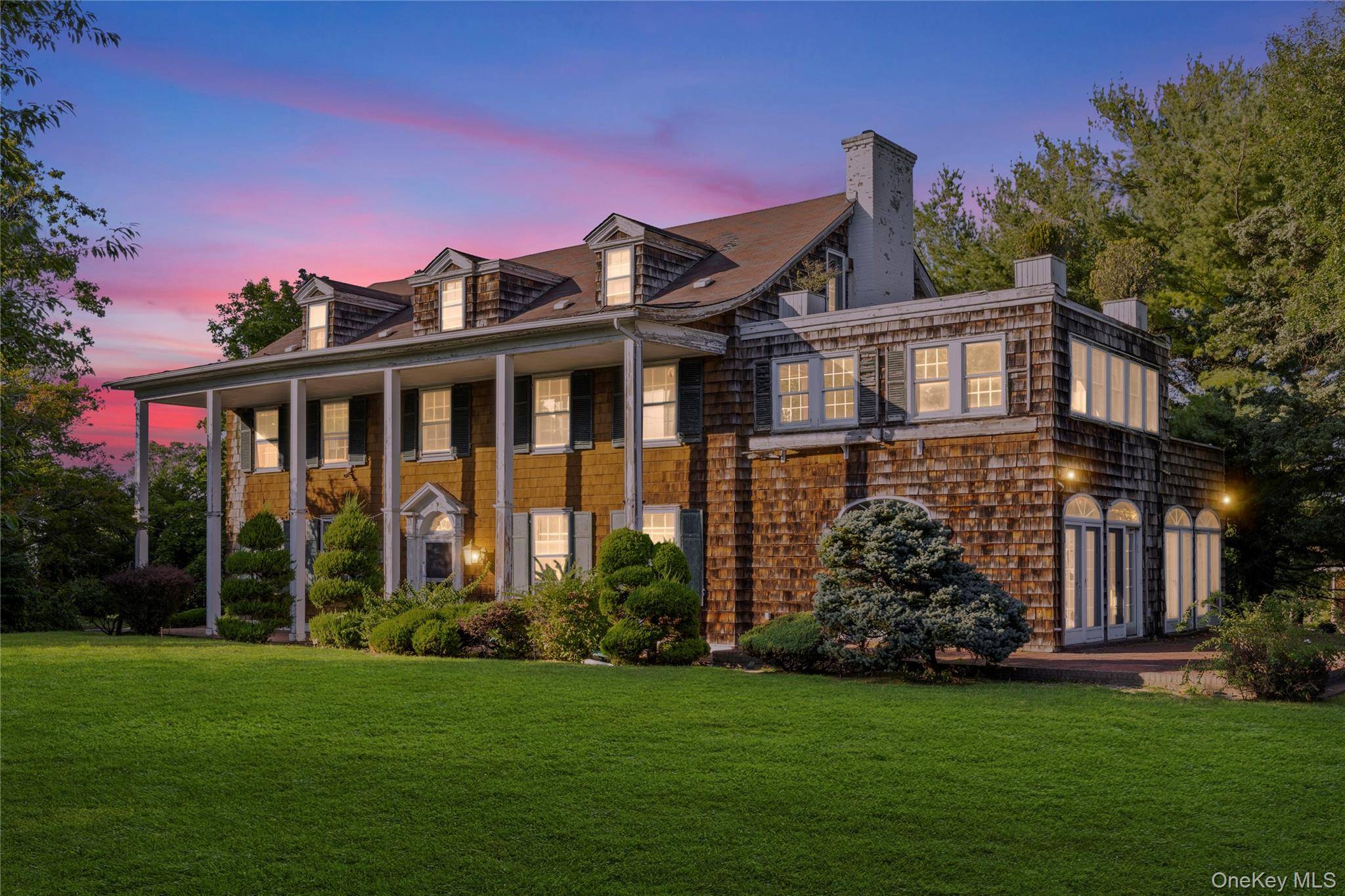Elegant Living in Lawrence 175 Burton Lane Discover timeless sophistication in this distinguished residence nestled in one of Lawrence s most coveted enclaves.