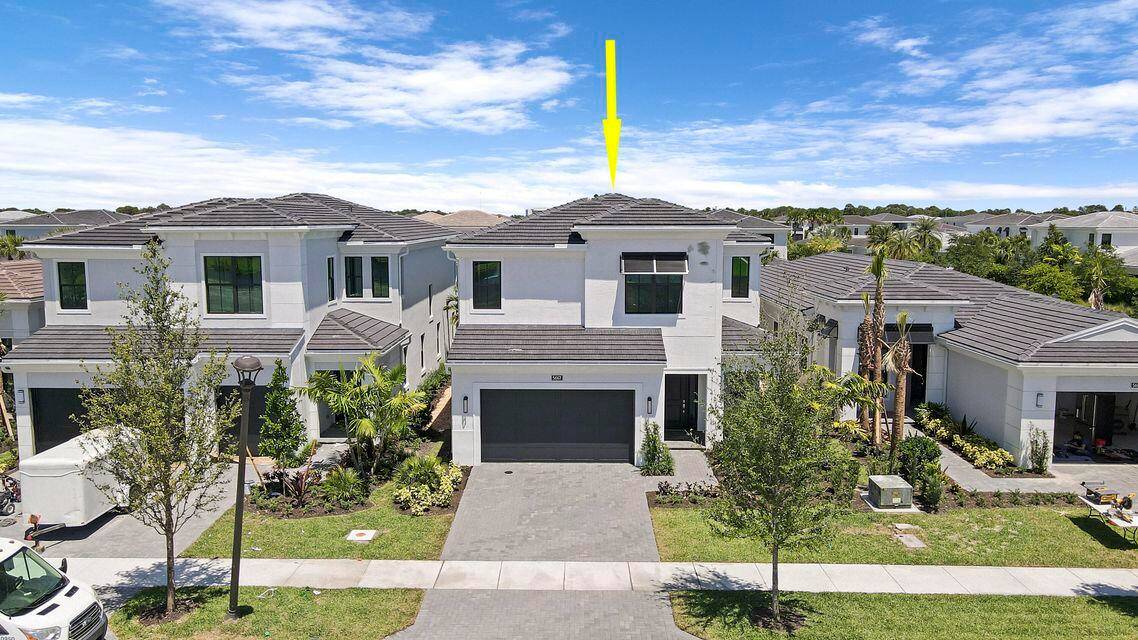 Absolutely stunning upgraded 'Hudson' Model at the Guard Gated Palm Beach Gardens Community ''Artistry''.