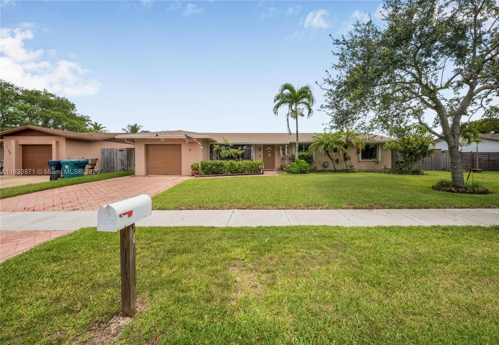 This charming Kendall home offers a comfortable and inviting living experience, perfect for families or anyone seeking a relaxed lifestyle.