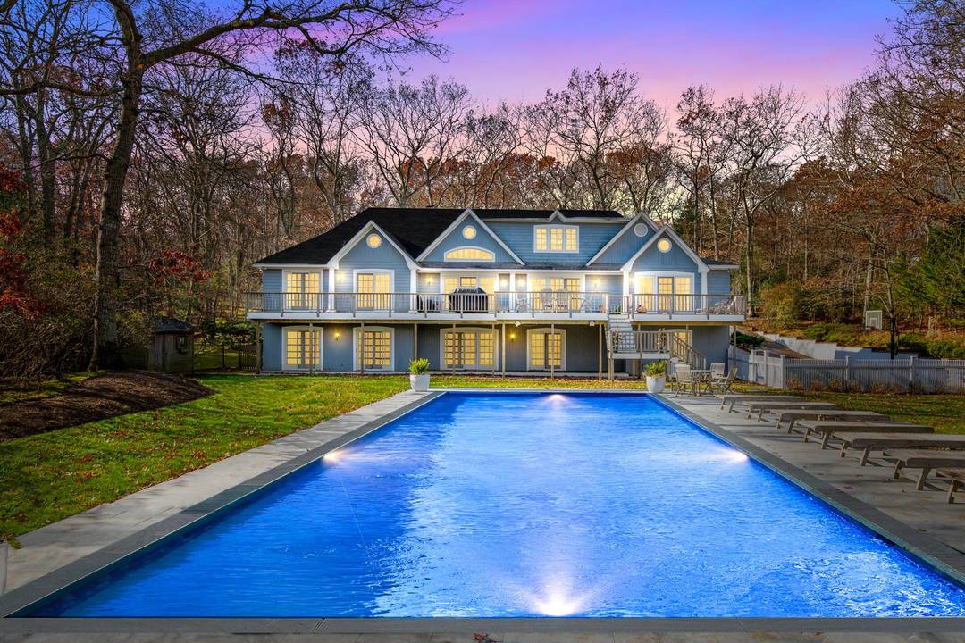 Traditional Home Set on Lushly Landscaped Acres